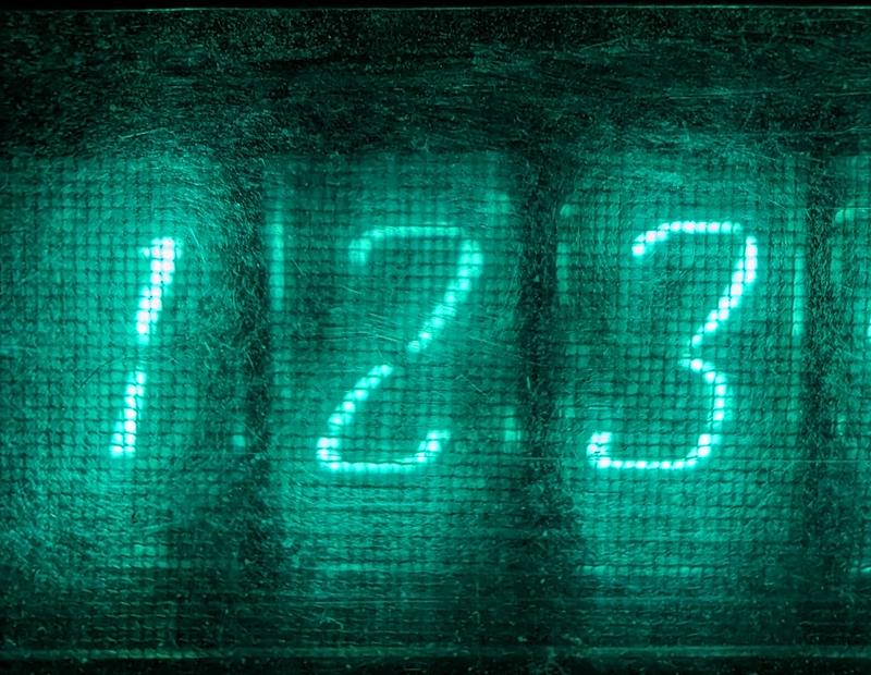 A close-up of the first three tubes, showing the digits 1 to 3. We can see the square grid in frond of the tubes, and with enough squinting, we can make out some of the non-lit wires.